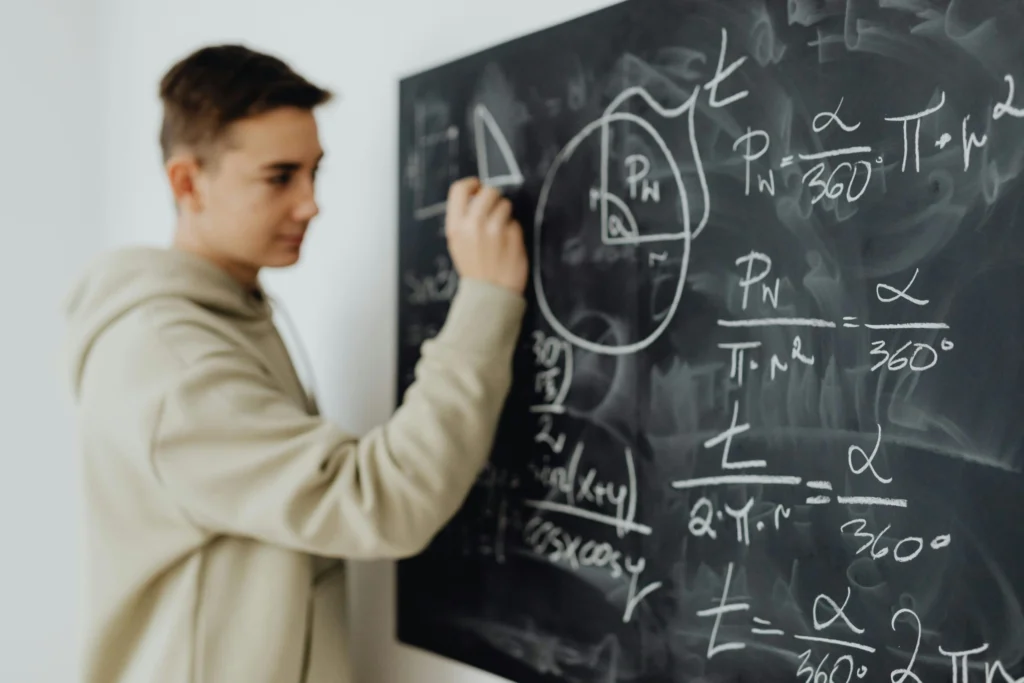 Student solving mathematics problems during a lesson at BISC British International School of Cracow