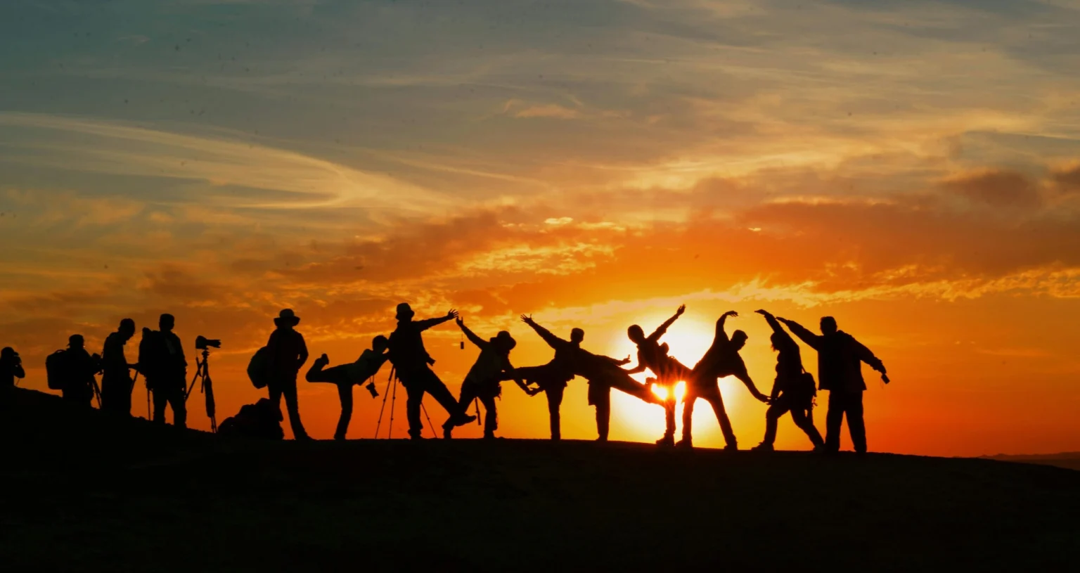 Students taking part in outdoor activities at sunset as part of the BISC British International School of Cracow secondary school experience